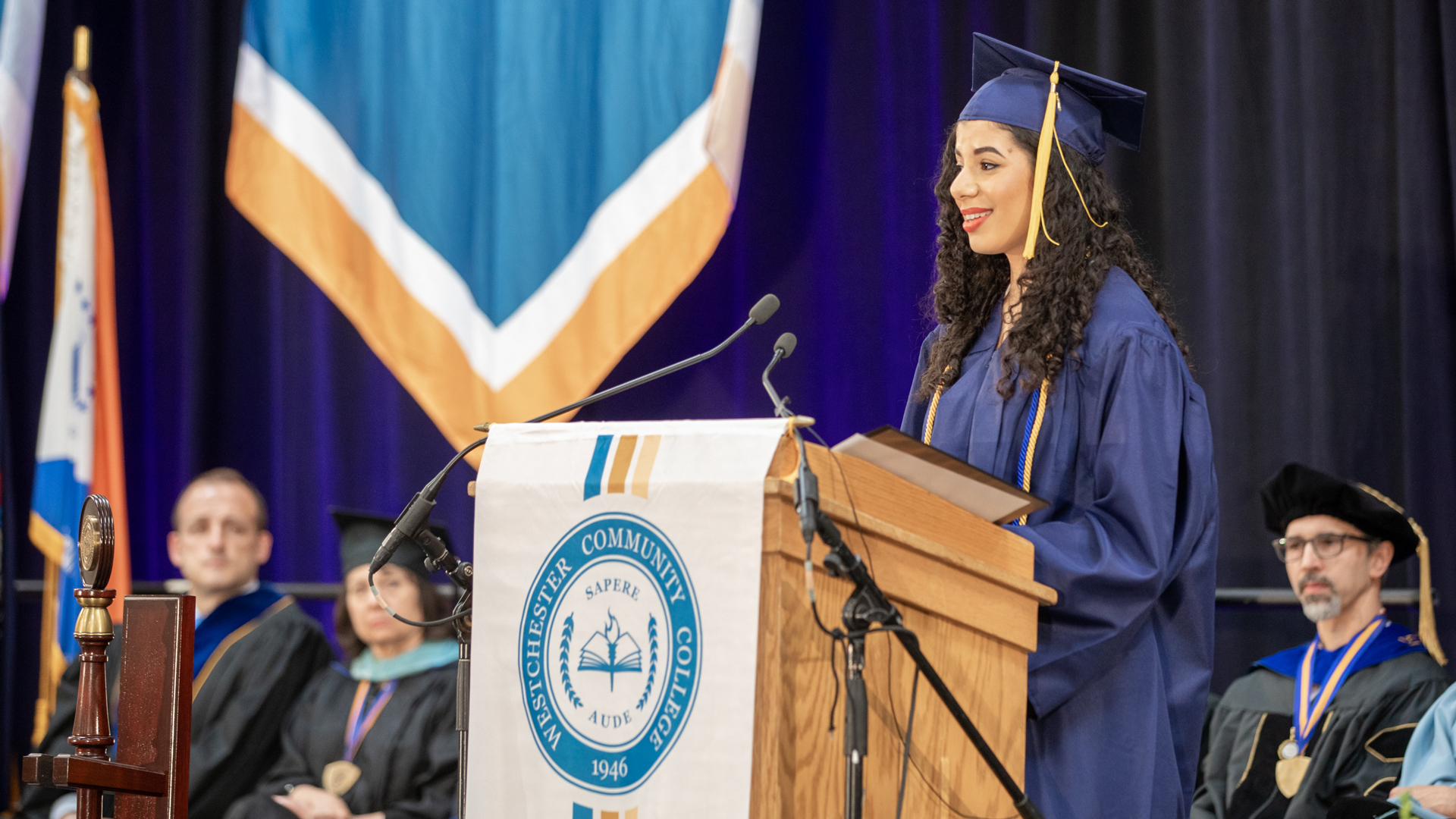 Student speaking at commencement