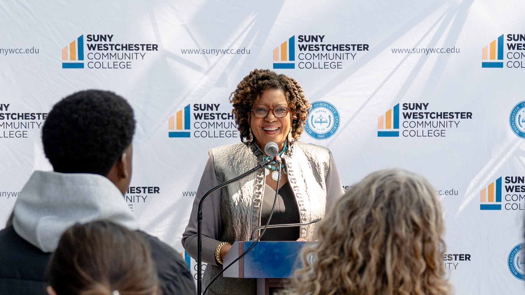 President Miles addresses an event audience